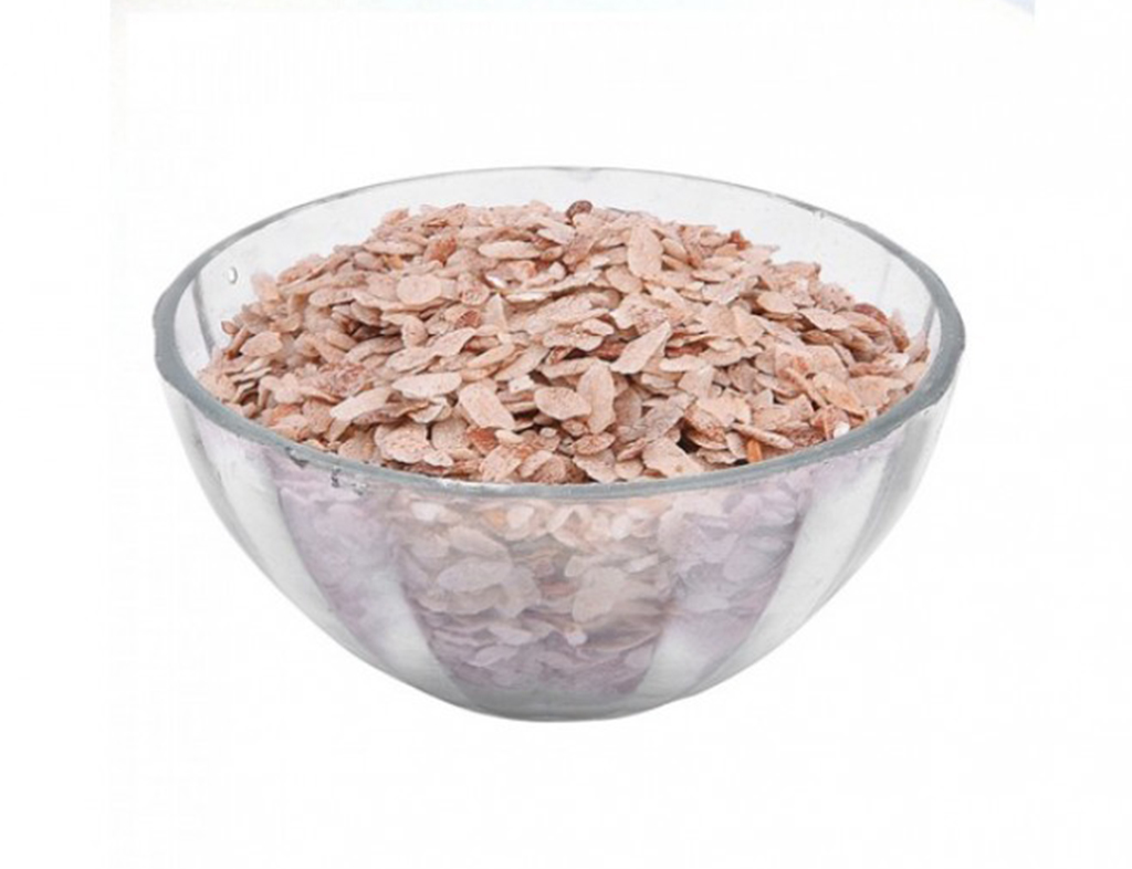 bowl of dried beet root powder isolated on white background